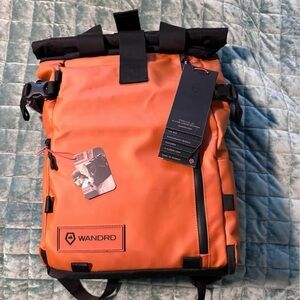 WANDRD Orange Roll-Top Backpack